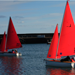 Red and Orange Access 303 Dinghies Sailing in Carrickfergus Harbour