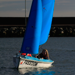 Light Blue Access 303 Dinghy sailing in Carrickfergus Harbour