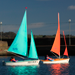 Orange and Green Access 303 Dinghies sailing in Carrickfergus Harbour