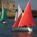 Orange, Purple and Green Access 303 Dinghies sailing in Carrickfergus Harbour