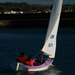 Purple and Green Access 303 Dinghies sailing in Carrickfergus Harbour