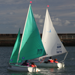 Purple and Green Access 303 Dinghies sailing in Carrickfergus Harbour