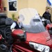 One of our young volunteers sitting on one of the motorbikes